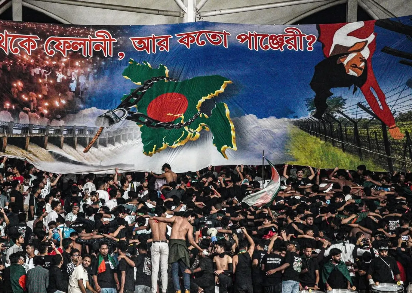 The block under a tifo of Bangladesh breaking its chains.